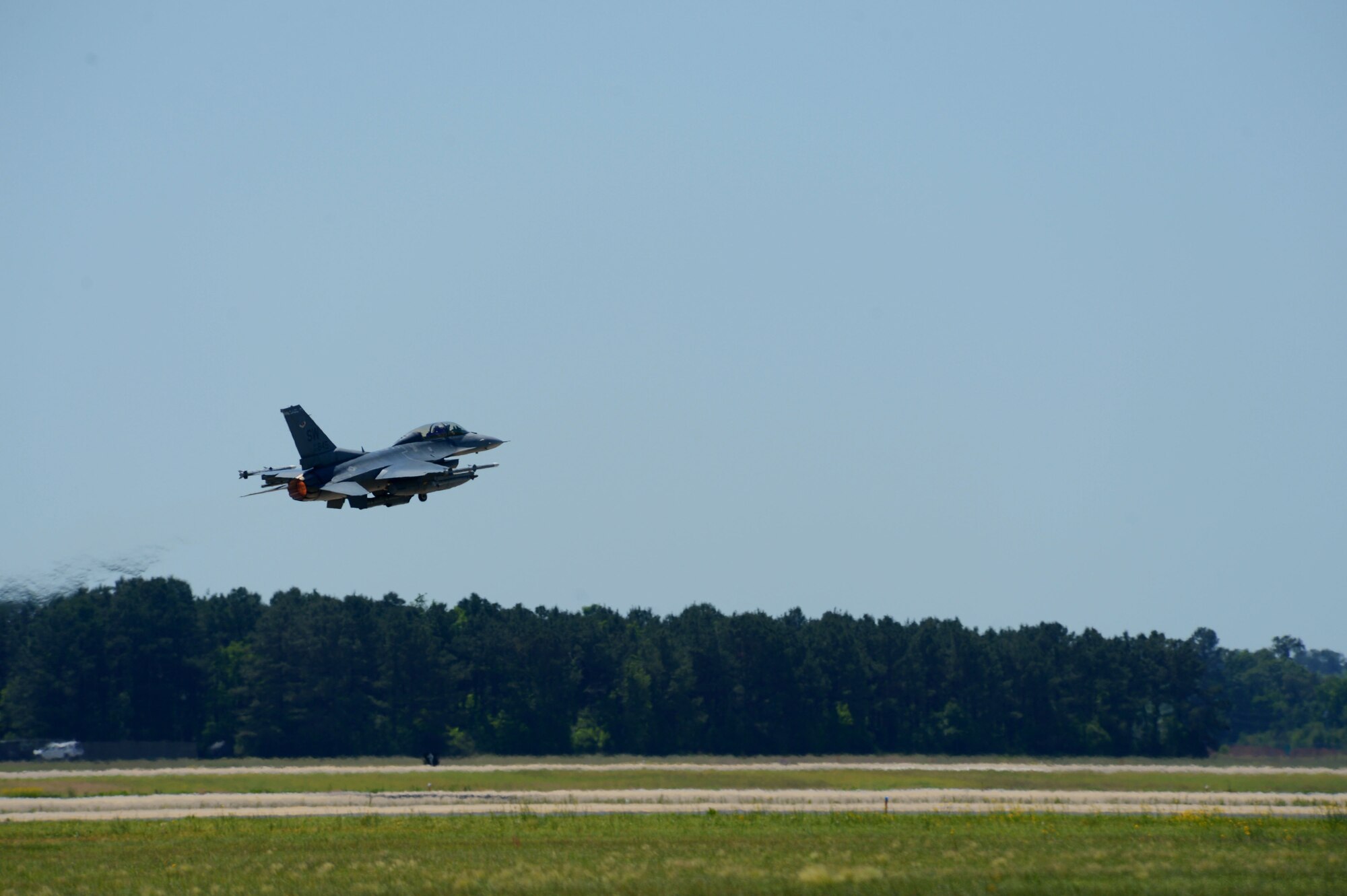 An F-16CJ Fighting Falcon takes off from the runway during Operational Readiness Exercise Weasel Victory 14-06 at Shaw Air Force Base, S.C., May 5, 2014. Several F-16s flew sorties during the exercise to demonstrate the ability of 20th Fighter Wing personnel to effectively generate and employ aircraft at a moment’s notice. (U.S. Air Force photo by Airman 1st Class Jensen Stidham/Released)