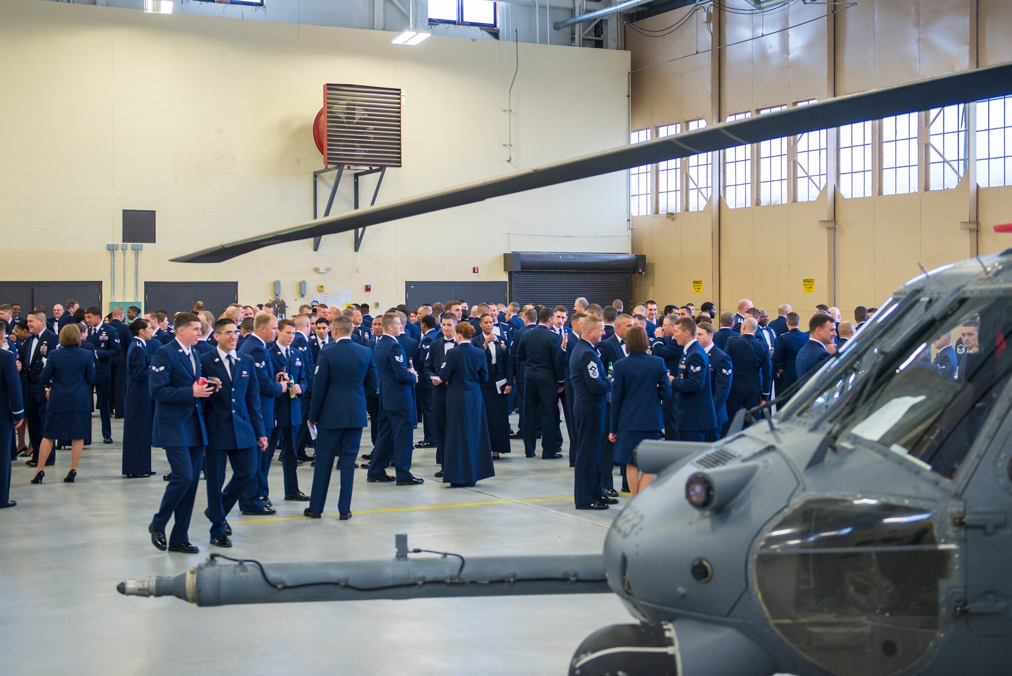 Airmen chat during the social hour preceding a dining-in at Moody Air Force Base, Ga., May 2, 2014. During the social hour, Airmen had the opportunity to talk with Moody leadership in a relaxed social environment. (U.S. Air Force photo by Airman 1st Class Ryan Callaghan/Released)