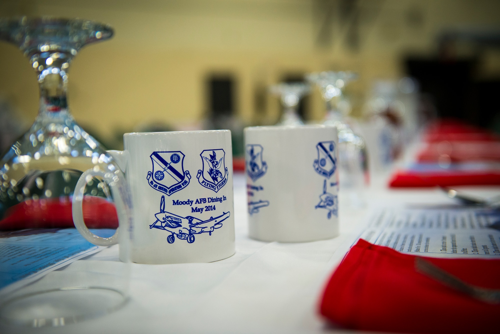Moody Air Force Base hosted a dining-in May 2, 2014. A dining-in is a formal gathering that includes a meal, toasts, entertainment and a speaker, meant to celebrate military tradition and heritage. (U.S. Air Force photo by Airman 1st Class Ryan Callaghan/Released)