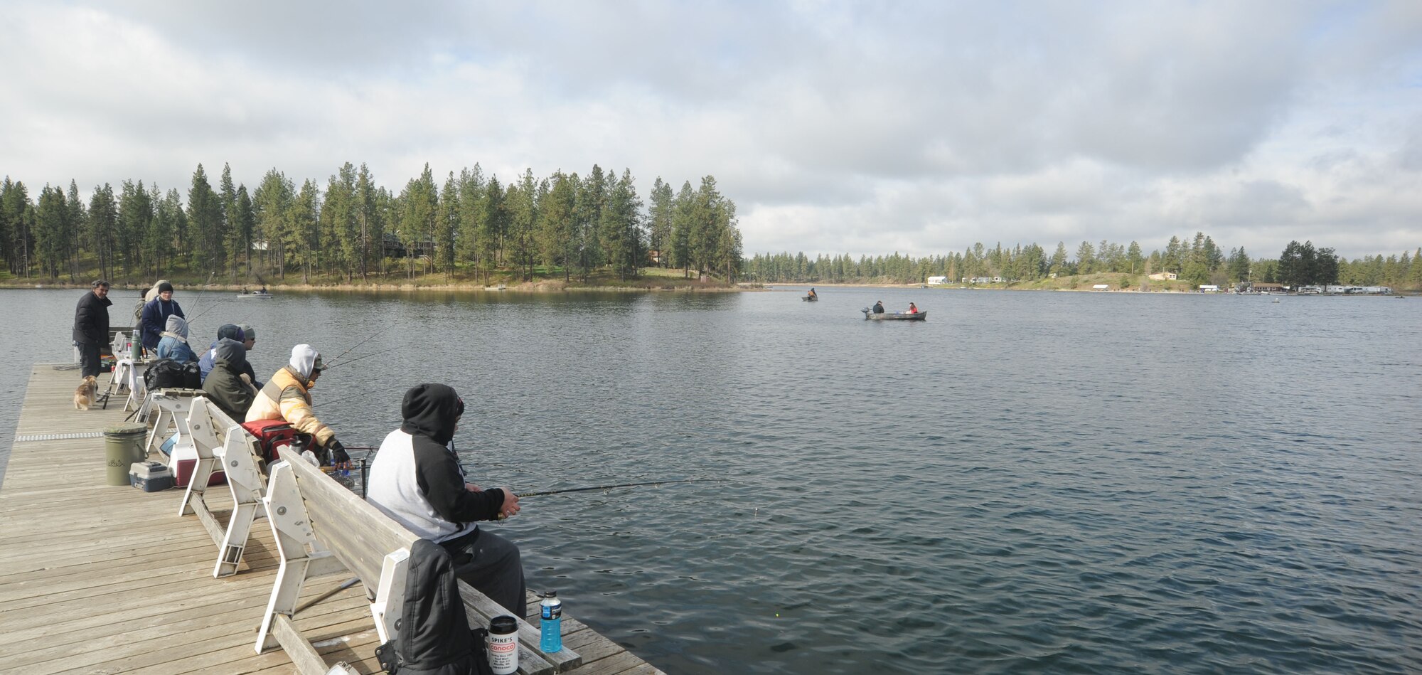 Visitors to Fairchild Air Force Base Clear Lake Resort fish during the opening day event in Cheney, Wash., April 26, 2014. Trout were among the species captured. (U.S. Air Force photo by Airman 1st Class Sam Fogleman/Released)