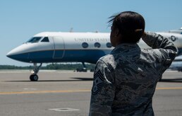 Chief Master Sgt. Gigi Manning, 315th Airlift Wing command chief, salutes Secretary of the Air Force Deborah Lee James’ aircraft as she arrives at Joint Base Charleston, S.C., May 6, 2014. James is the 23rd Secretary of the Air Force and was appointed to the position Dec. 20, 2013. She is responsible for the affairs of the Department of the Air Force, including organizing, training, equipping and providing for the welfare of its more than 690,000 active-duty, Guard, Reserve and civilian Airmen and their families. (U.S. Air Force photo/ Airman 1st Class Clayton Cupit)