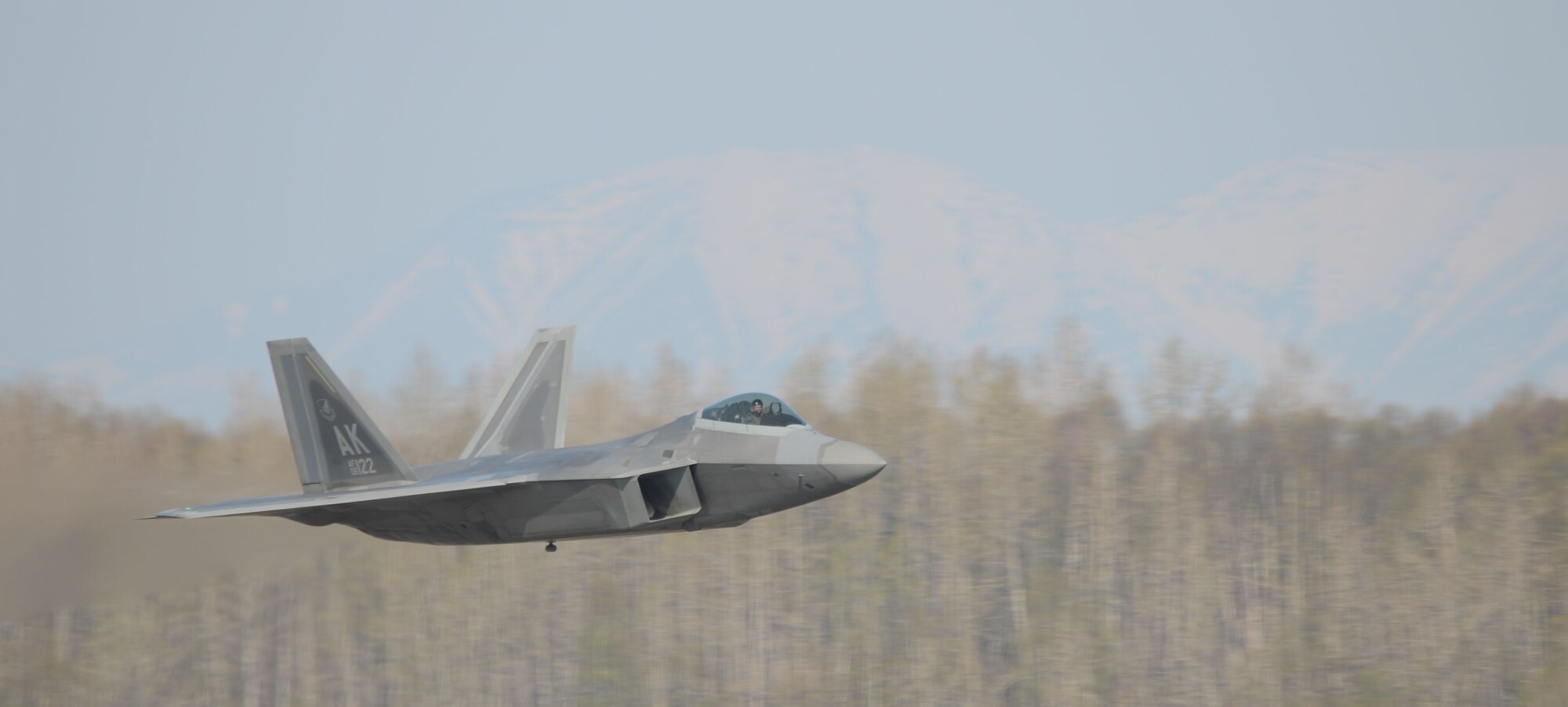 A Reserve F-22 pilot takes off during the 477th Fighter Group Unit Training Assembly weekend here May 3. The 477th Fighter Group, Alaska's only Air Force Reserve unit, made history by being the first to fly a 4,000 flight hour sortie in the F-22. (U.S. Air Force Photo/ Tech. Sgt. Dana Rosso)