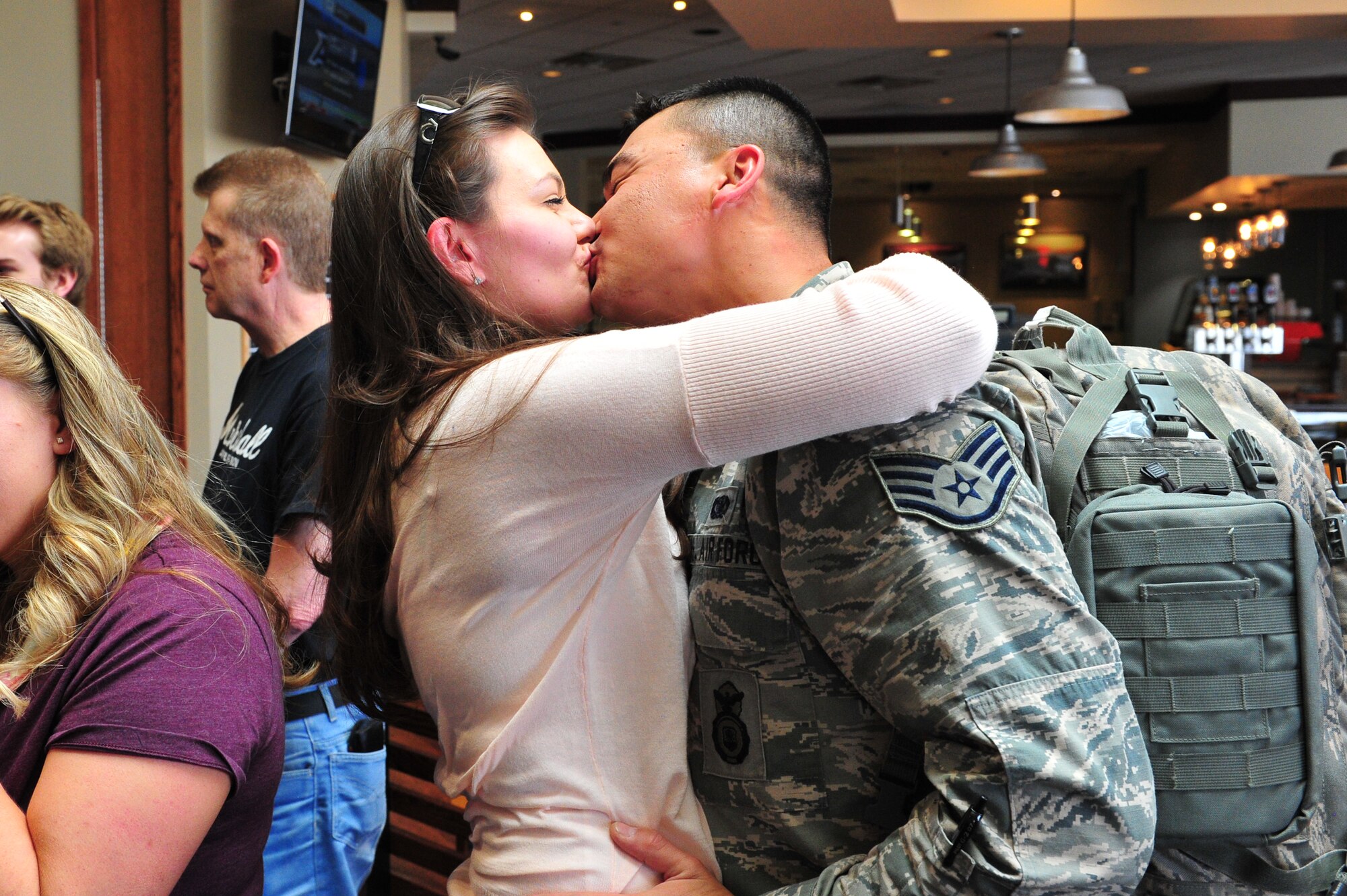 Air Force Reserve Staff Sgt. Ronald Metherell receives a long awaited welcome from his wife during a homecoming from Southwest Asia May 3, 2014, at the Colorado Spring Airport in Colorado Springs, Colo. Metherell and nearly 15 other AF Reservists assigned to the 310th Security Forces Squadron provided integrated base defense, physical security and antiterrorism and force protection measures on behalf of U.S. and allied personnel at the Manas Transit Center in the Kyrgyz Republic.
(U.S. Air Force photo/Tech. Sgt. Nicholas B. Ontiveros)