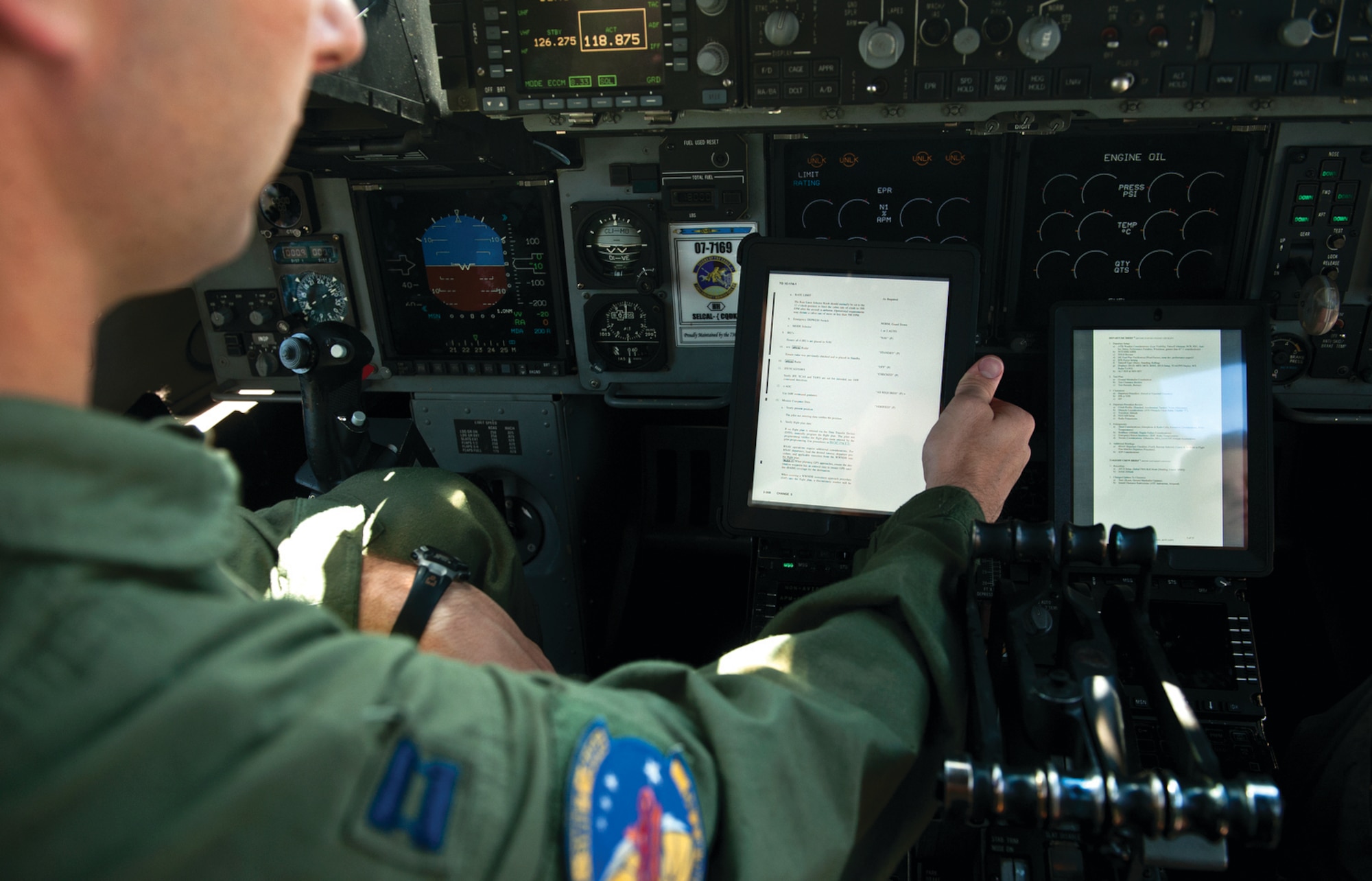 Capt Timothy Jastrab follows preflight procedures for a C-17 Globemaster III via an Electronic Flight Bag that’s being phase tested by AMC at Dover AFB, Del.