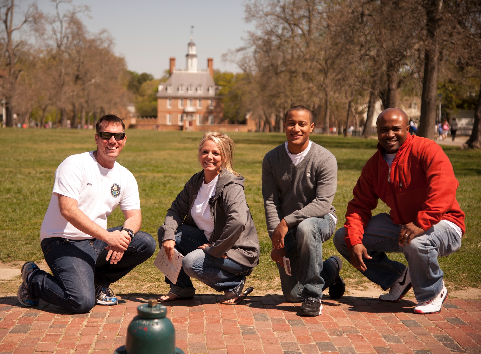Four of the six Air Combat Command Outstanding Airmen of the Year winners pose in front of the Governor’s Palace in Colonial Williamsburg, Va. (U.S. Air Force photo by Staff Sgt. Steve Stanley/Released)