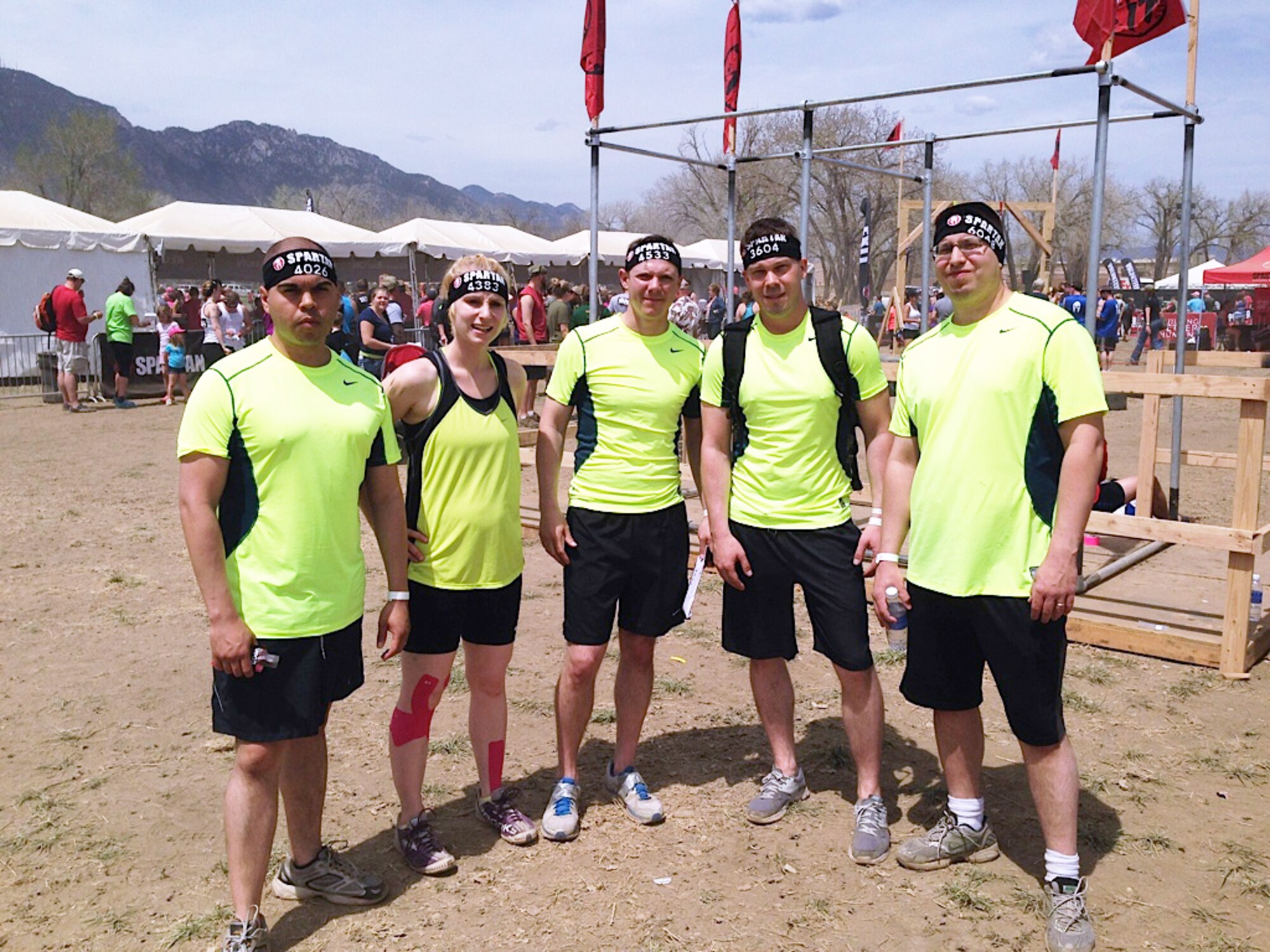 Louis Deanda, Master Sgt. Rachel Forman, 1st Lt. Jesse Gilbert, Staff Sgt. Derek Butler and Master Sgt. Zachery Mleko prepare for a Spartan Race held May 3, 2014, at Fort Carson, Colo.  A Spartan Race is an obstacle course race designed to test resilience, stamina, quick decision making skills, and the ability to laugh in the face of adversity. (Courtesy photo)