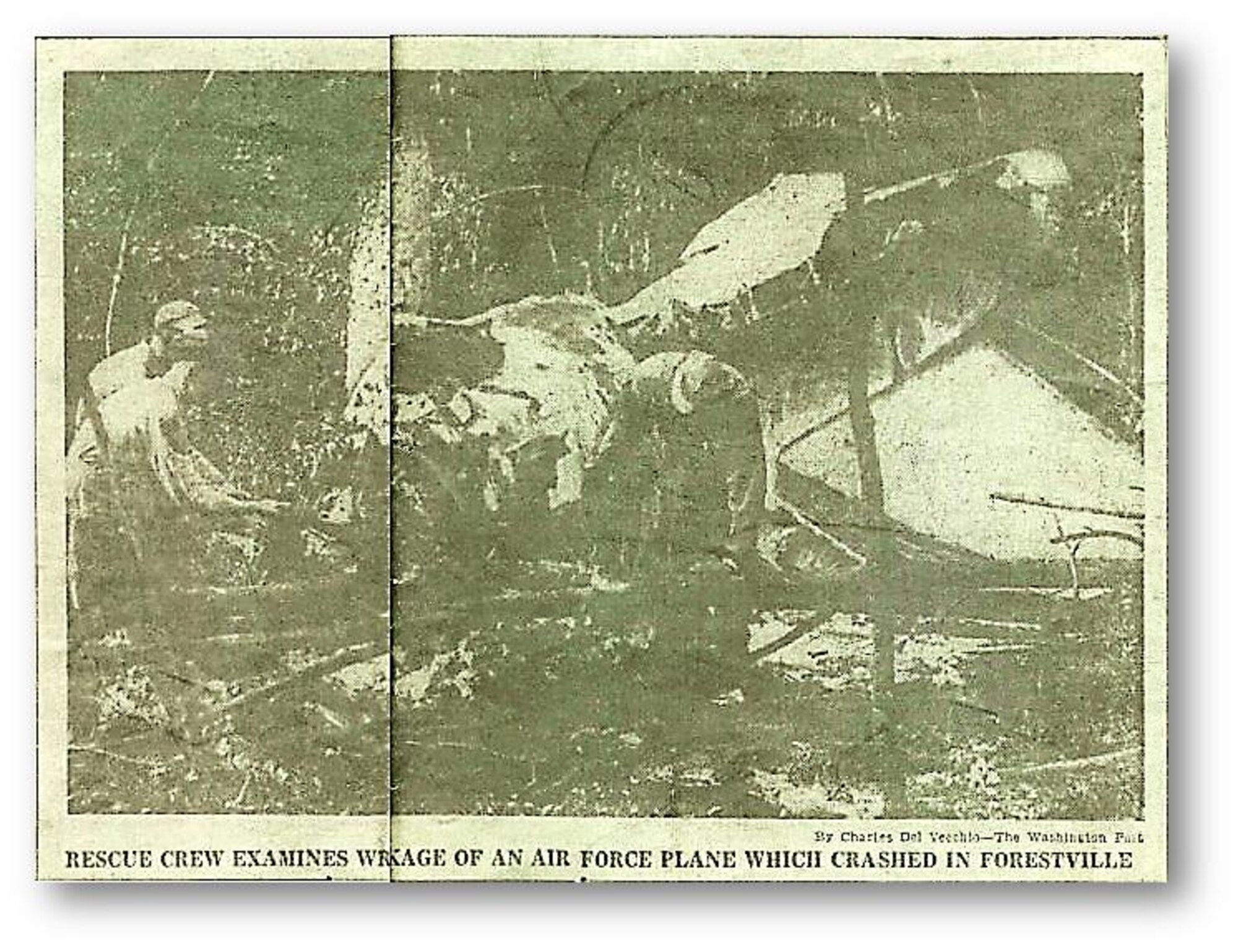 Archived newspaper photo of wreckage at Capt. Francis T. Evans, Jr.'s, plane crash site. Article retrieved from home.comcast.net/~thefrancistevansjrstory (Washington Post photo by Charles Del Vecchio)
