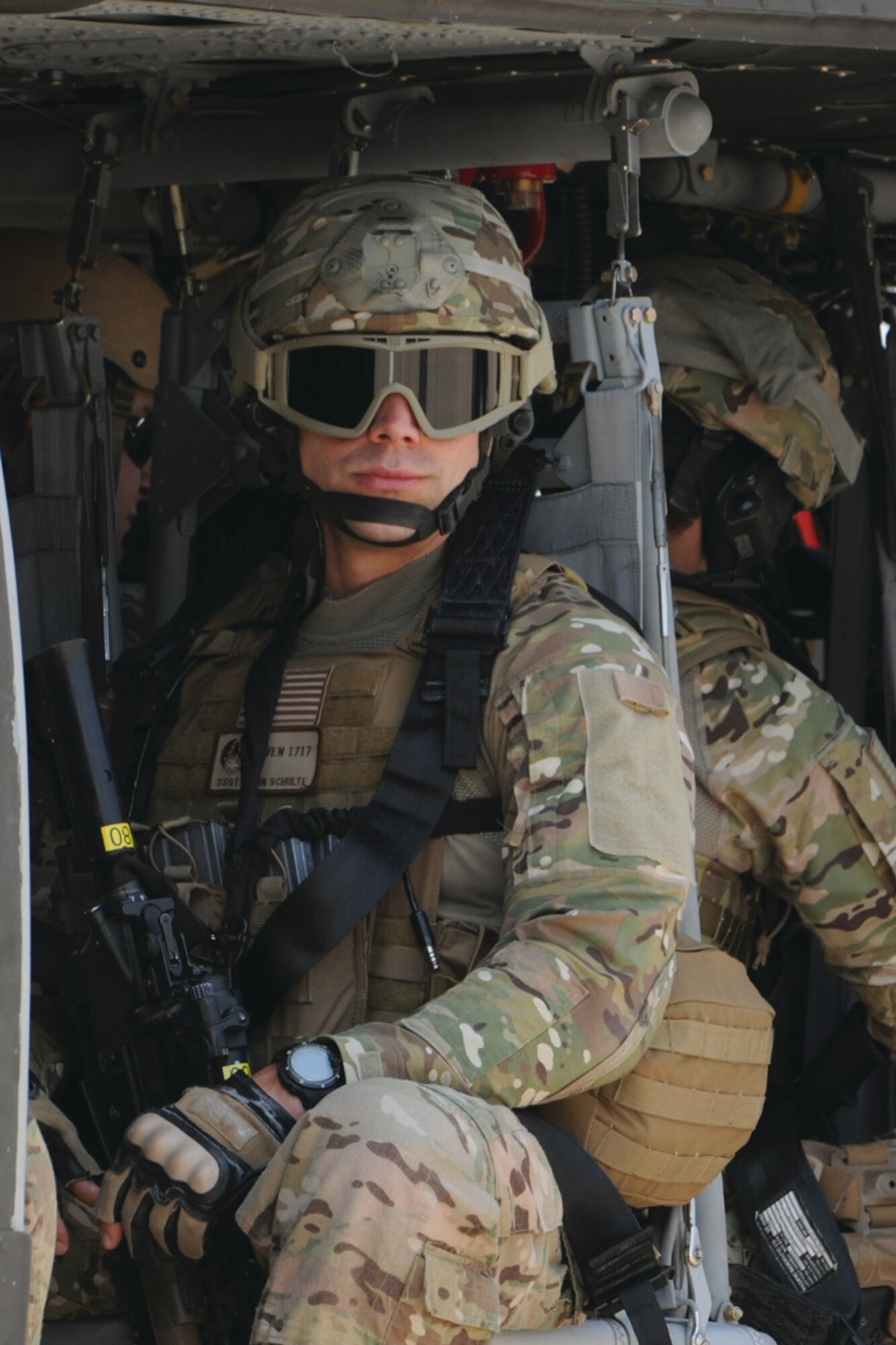 A Security Forces Airman preparing to deploy
to Afghanistan waits on board a UH-60 Black
Hawk helicopter at Joint Base McGuire-Dix-
Lakehurst, N.J. while attending Security
Forces pre-deployment training at the U.S.
Air Force Expeditionary Center.