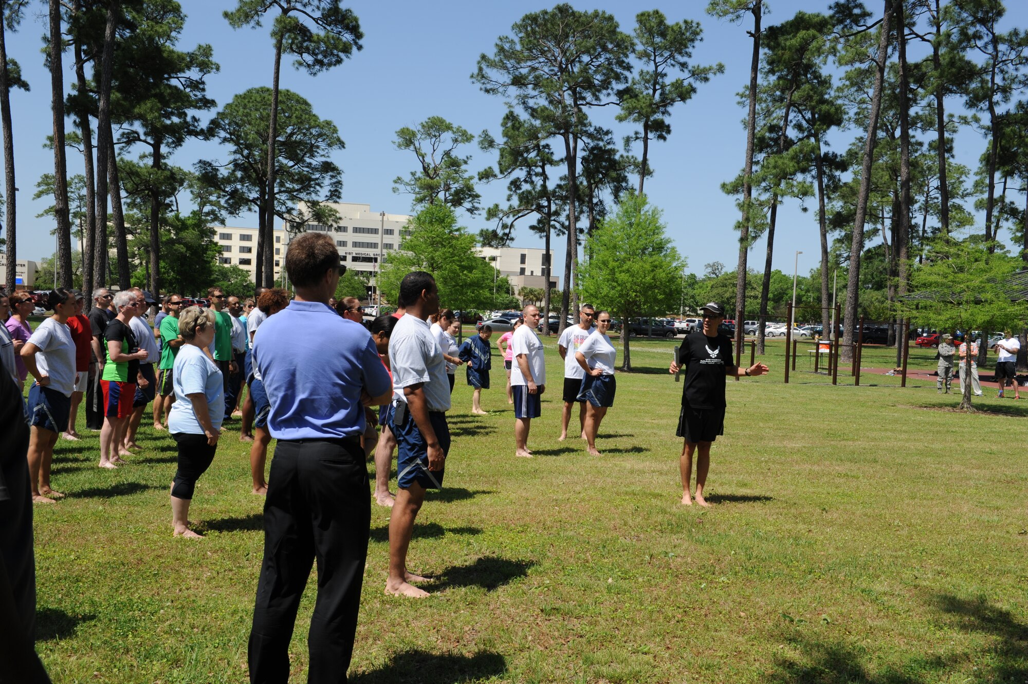 Lt. Col. (Dr.) Antonio Eppolito, chief of Air Force telemedicine, instructs members of Team Keesler in the art and science of becoming a healthier and better runner May 1, at the Crotwell Track, Keesler Air Foce base, Miss. The 81st Aerospace Medicine Squadron health and wellness center hosted the hands-on workshop with Eppolito, a 19-year member of the Air Force Running Team, as the subject matter expert. (U.S. Air Force photo by Airman 1st Class Stephan Coleman)