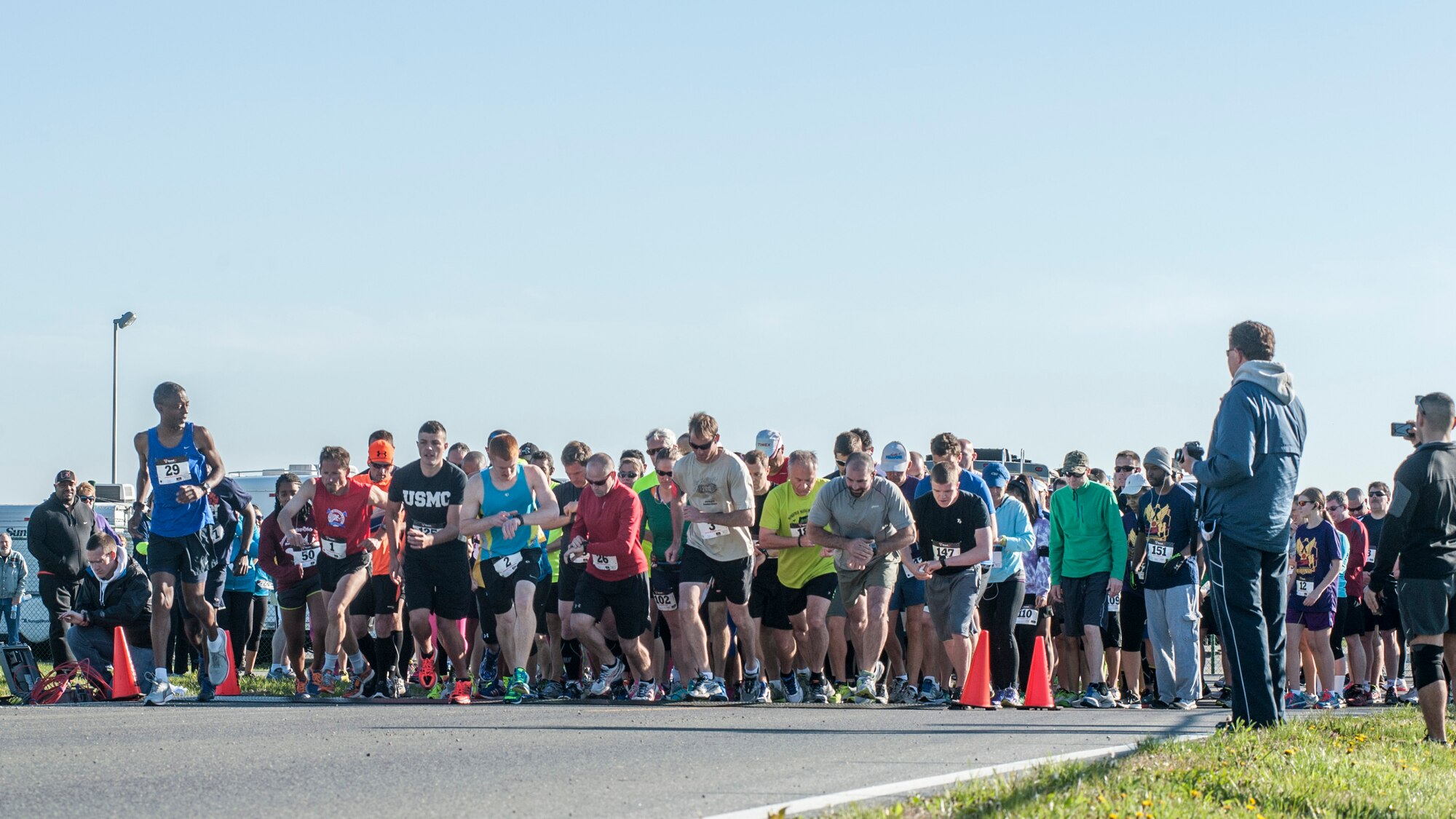 Racers take off at the start of the Heritage Half-Marathon and 5K April 27, 2014, at the Air Mobility Command Museum on Dover Air Force Base, Del. The fastest runner for the half-marathon finished at 1:19:58 and fastest 5K finish was 17:36. (U.S. Air Force photo/Senior Airman Jared Duhon)