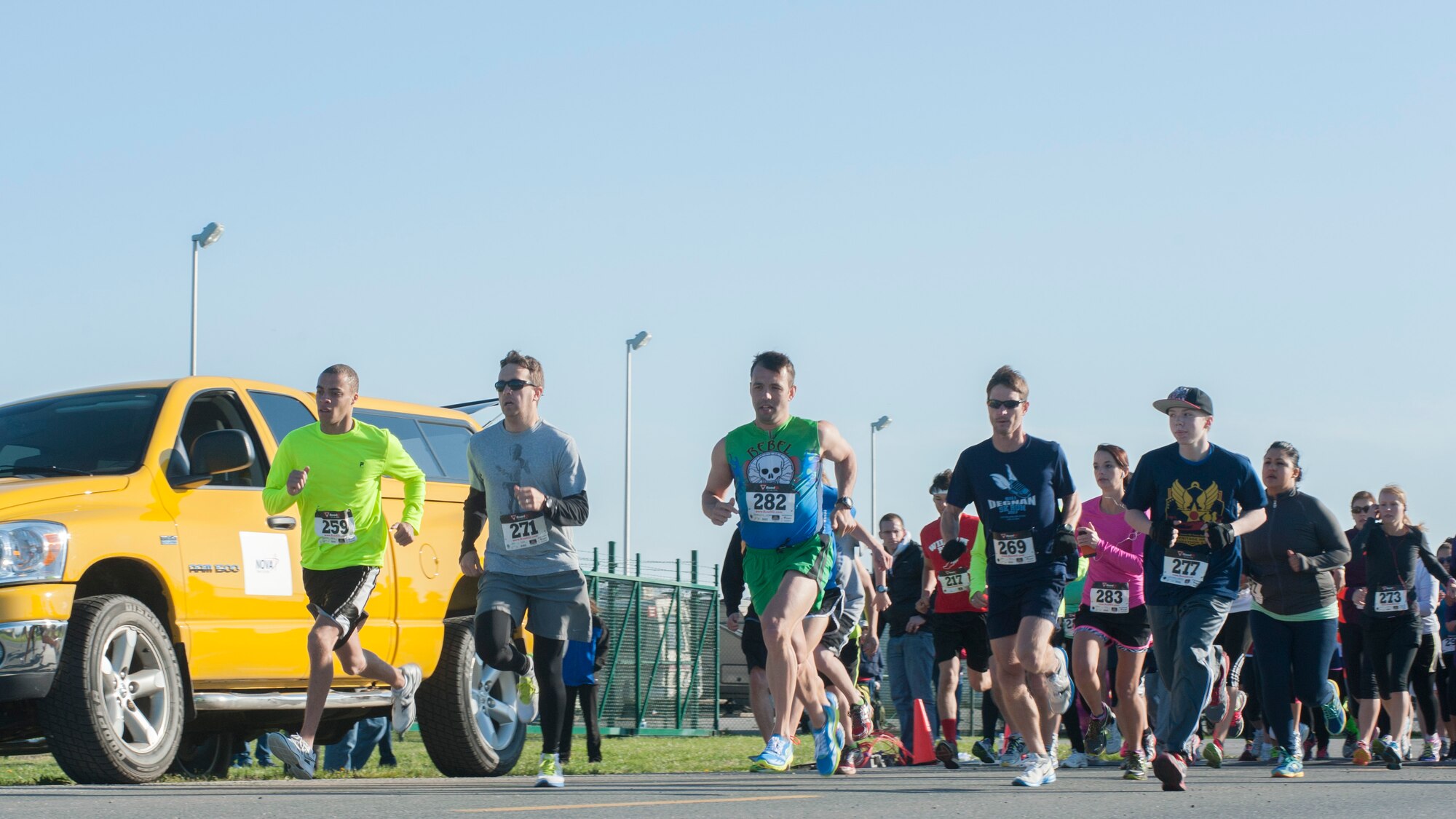 Runners begin the Heritage Half-Marathon and 5K April 27, 2014, at the Air Mobility Command Museum on Dover Air Force Base, Del. More than 260 racers finished the race which took place on Dover AFB’s flight line and surrounding areas. (U.S. Air Force photo/Senior Airman Jared Duhon) 