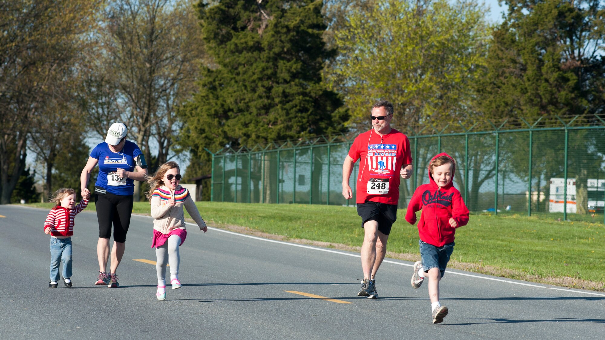 Children sprint at the start of the "Kiddie K" race April 27, 2014, at the Air Mobility Command Museum on Dover Air Force Base, Del. The "Kiddie K" was held before the start of the Heritage Half-Marathon and 5K. (U.S. Air Force photo/Senior Airman Jared Duhon)