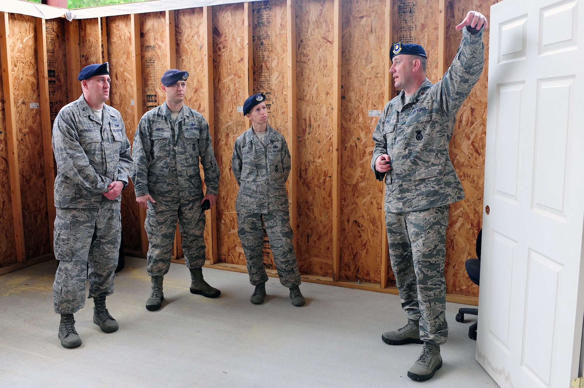Maj. Troy Jones (right), 4th Security Forces Squadron commander, showcases the squadron’s “shoot house,” April 29, 2014, at Seymour Johnson Air Force Base, N.C. The shoot house is a training facility used by 4th SFS Airmen to hone their combat skills and tactics to prepare them for operations downrange. (U.S. Air Force photo/Senior Airman John Nieves Camacho)