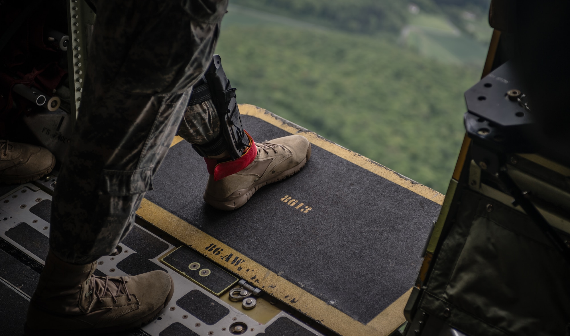 U.S. Army Sgt. Jordan Markel Witz, 5th Quartermaster Theater Aerial Delivery 
Company jump master, a Harrisburg, Pennsylvania native, prepares to exit a 
C-130J Super Hercules as part of International Jump Week over Germany, May 6, 
2014. A total of 97 foreign and allied partners tested, built and strengthened 
partnerships during jump week alongside American Airmen and Soldiers. (U.S. 
Air Force photo/Airman 1st Class Jordan Castelan)