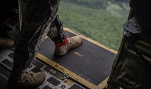 U.S. Army Sgt. Jordan Markel Witz, 5th Quartermaster Theater Aerial Delivery 
Company jump master, a Harrisburg, Pennsylvania native, prepares to exit a 
C-130J Super Hercules as part of International Jump Week over Germany, May 6, 
2014. A total of 97 foreign and allied partners tested, built and strengthened 
partnerships during jump week alongside American Airmen and Soldiers. (U.S. 
Air Force photo/Airman 1st Class Jordan Castelan)