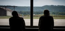 Two German military parachutists waits to board a C-130J Super Hercules from 
the 37th Airlift Squadron, as part of International Jump Week on Ramstein Air 
Base, Germany, May 6, 2014. A total of 97 foreign and allied partners tested, 
built and strengthened partnerships during jump week alongside American Airmen 
and Soldiers. (U.S. Air Force photo/Airman 1st Class Jordan Castelan)