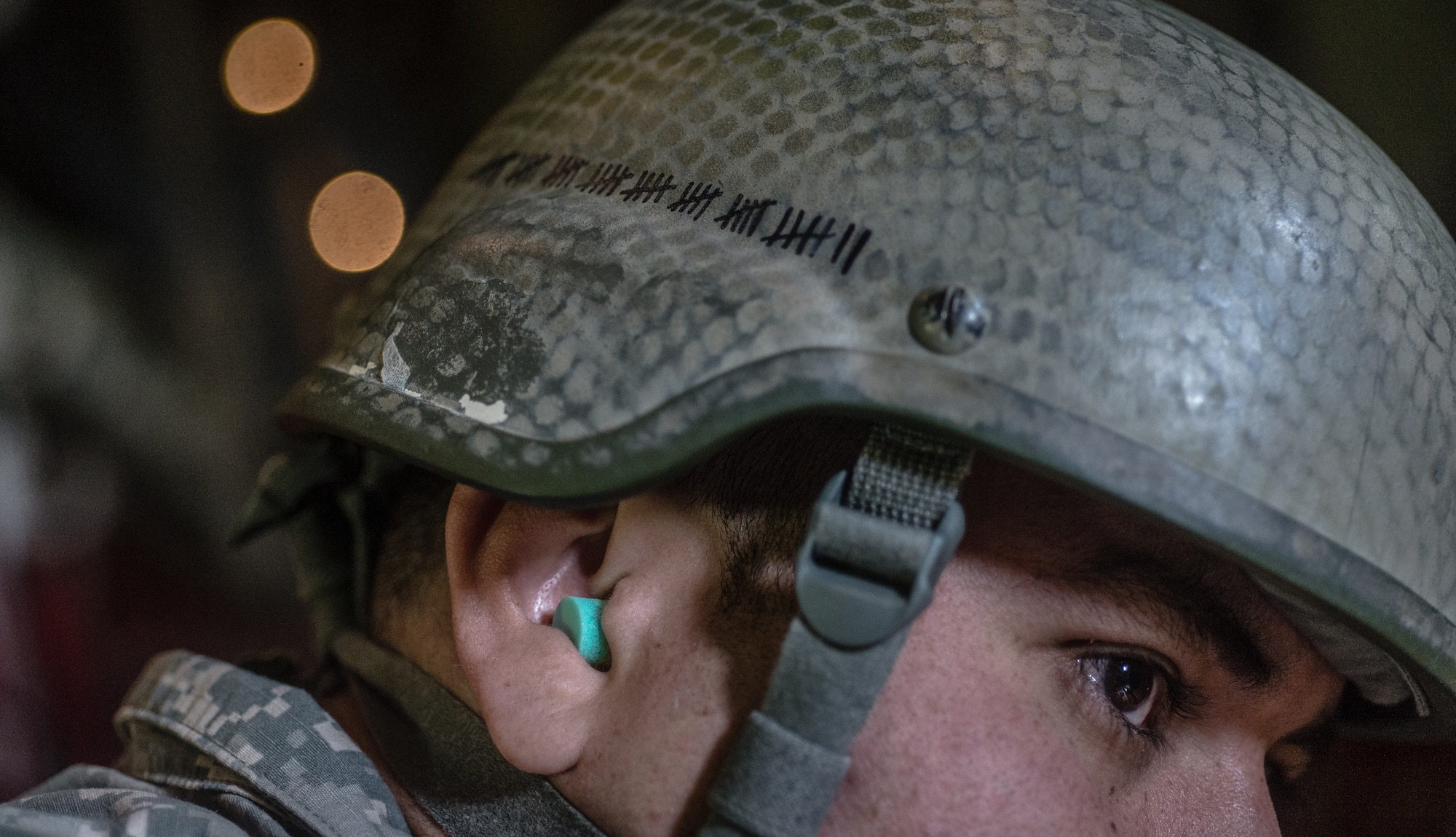 U.S. Army Staff Sgt. Alexander Munoz-Lamos, Special Operations Command Africa air NCO, a Fayetteville, North Carolina resident, waits his turn for an aerial disembarkment inside a C-130J Super Hercules as part of  International Jump Week over Germany, May 5, 2014. A total of 97 foreign and allied partners tested, built and strengthened partnerships during jump week alongside American Airmen and Soldiers. (U.S. Air Force photo/Airman 1st Class Jordan Castelan)