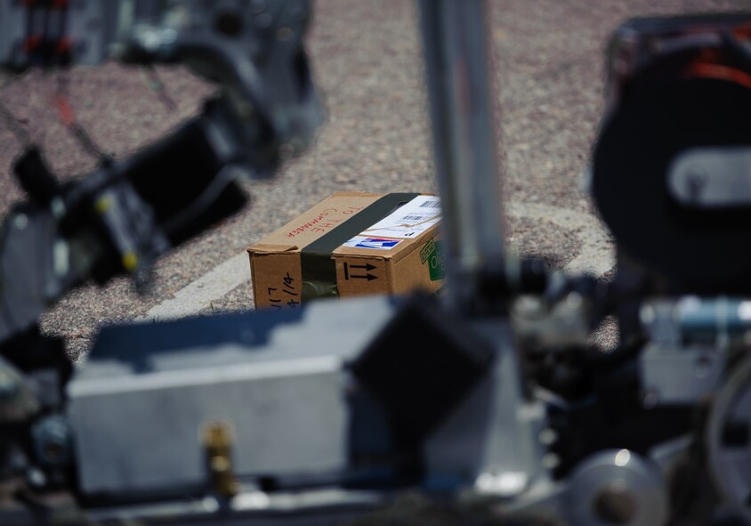 A Wolf Pack Explosive Ordnance Disposal robot begins operations to terminate a suspicious package during exercise Beverly Bulldog 14-2 at Kunsan Air Base, Republic of Korea, May 6, 2014. The EOD robot supports the wings mission by allowing Airmen to get close to objectives without risking a life. The wing inspection team kept constant injects rolling in, keeping Airmen’s readiness razor sharp. (U.S. Air Force photo by Senior Airman Armando A. Schwier-Morales/Released)