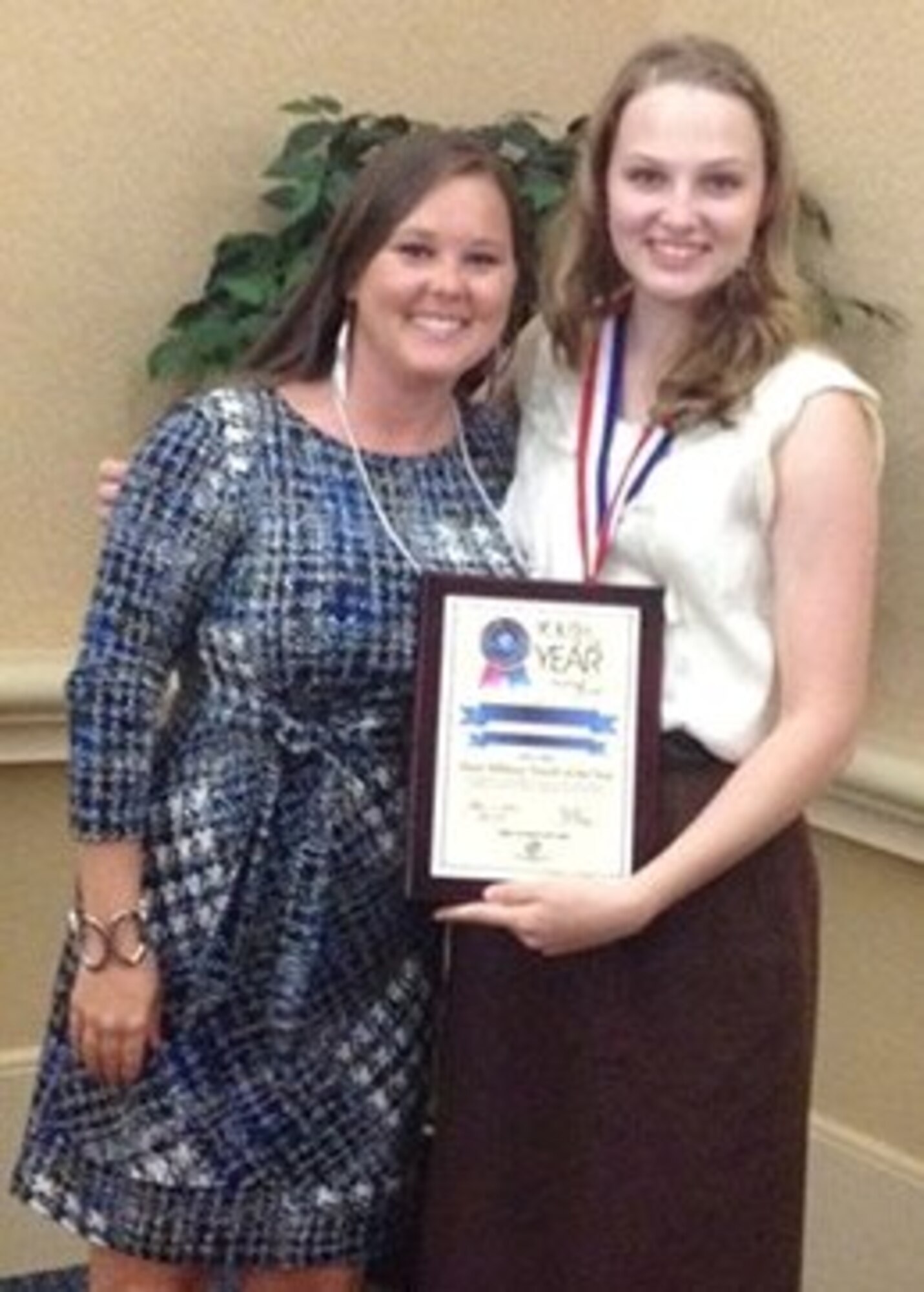 Lora Snyder, Tyndall Youth Activity Center Youth of the Year advisor and program assistant, (left) and Stephanie Boling, Florida Military Youth of the Year, (right) pose for a photo April 27 in Orlando, Fla. for the state Youth of the Year competitions. Youth of the Year is the highest honor a Boys and Girls Club member can receive.  (Courtesy photo) 