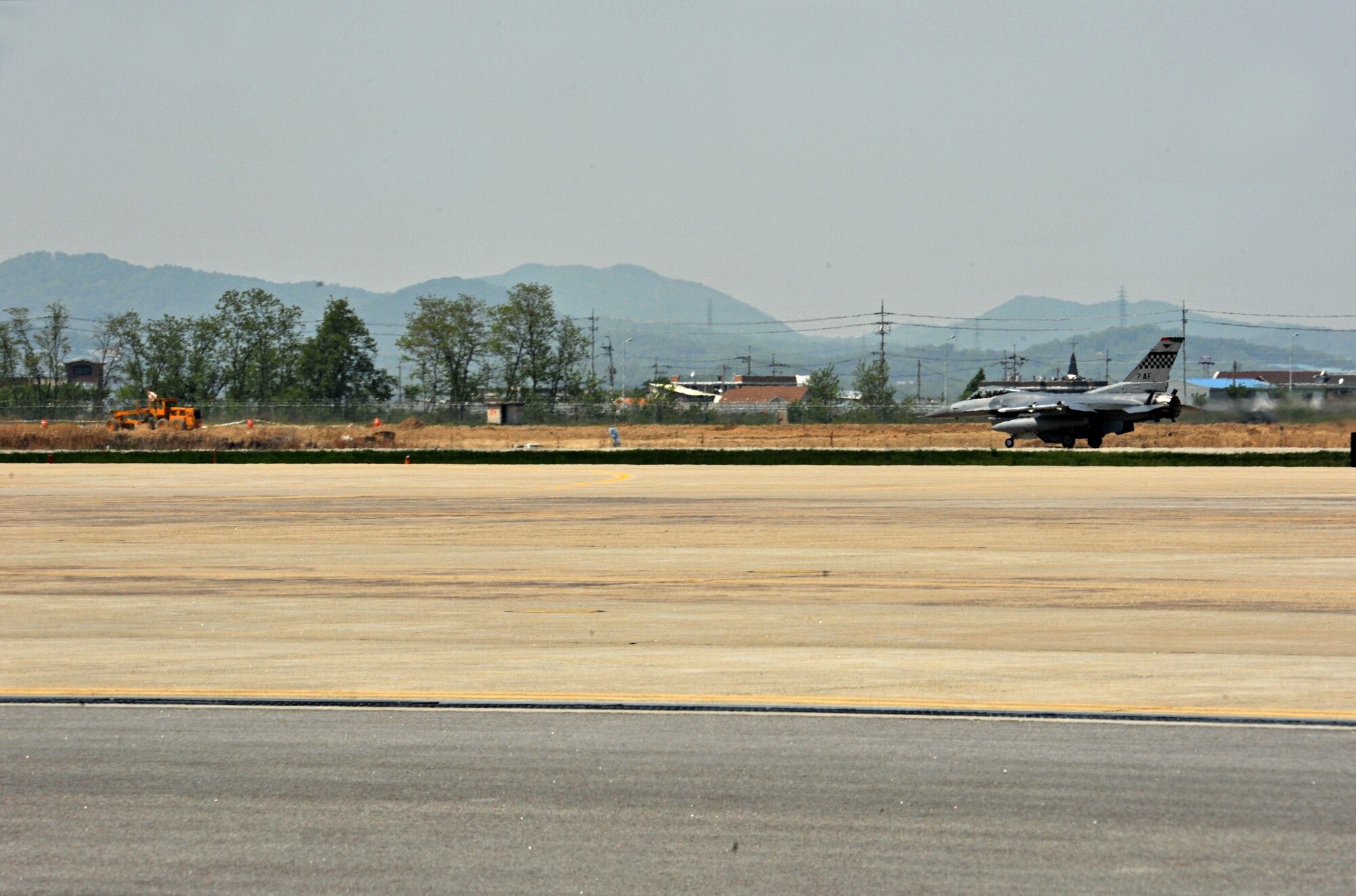 An F-16 Fighting Falcon from the 36th Fighter Squadron touches down after a training sortie during Operational Readiness Exercise Beverly Bulldog 14-02 at Osan Air Base, Republic of Korea, May 6, 2014. Aircrews and pilots work together to accomplish flying sorties during OREs as they would in a real-world contingency operation. (U.S. Air Force photo/Airman 1st Class Ashley J. Thum)