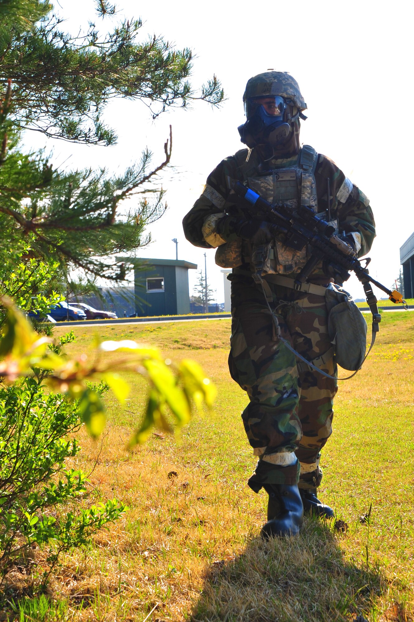 U.S. Air Force Airman 1st Class Garrett Pako, 35th Security Forces Squadron entry controller, conducts a security walkthrough near the flightline’s entry control point at Misawa Air Base, Japan, May 6, 2014. After notifying his fellow security team of the situation, Pako conducted one last sweep of the area to secure the area. (U.S. Air Force photo/Senior Airman Jose Hernandez-Domitilo)