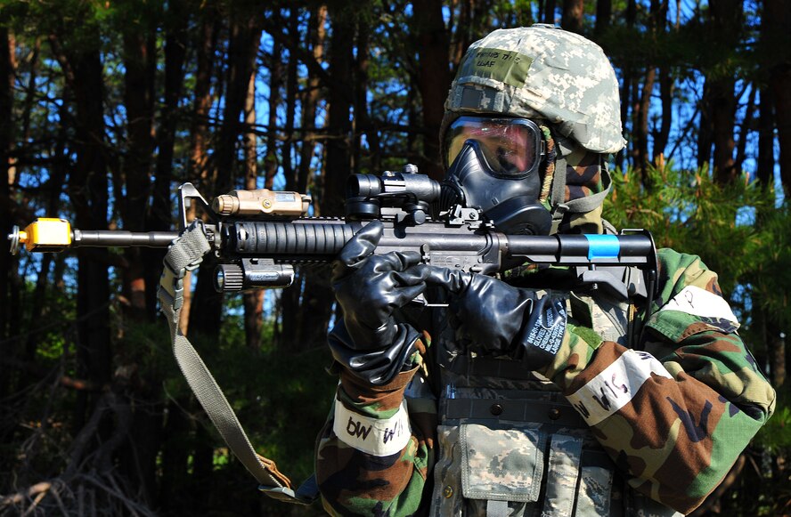 U.S. Air Force Airman 1st Class Tyler Phillips, 35th Security Forces Squadron entry controller, stands guard after his team neutralized an enemy threat during an Operational Readiness Exercise at Misawa Air Base, Japan, May 6, 2014. After neutralizing the threat, team members secured the scene and surrounding area. (U.S. Air Force photo/Senior Airman Jose Hernandez-Domitilo)