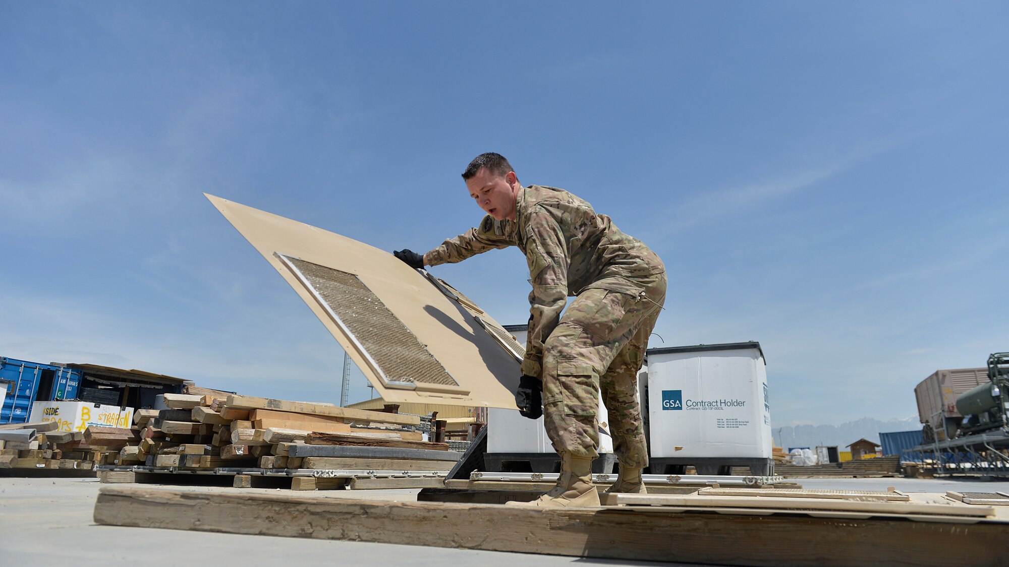 Staff Sgt. Marcin Vande Hei, 455th Expeditionary Logistics Readiness Squadron Central Command Materiel Recovery Element non-commissioned officer-in-charge lifts equipment panels May 2, 2014 at Bagram Airfield, Afghanistan.  Vande Hei, is part of a CMRE team that is responsible for identifying, storing and redeploying assets to the U.S. or disposing of items located throughout the region. The CMRE team has helped recover more than 60 pieces of equipment worth about $1.66 million within the last eight months. Vande Hei is a native of Washington, D.C. and is deployed from Langley Air Force Base, Va. (U.S. Air Force by Staff Sgt. Evelyn Chavez/Released)
