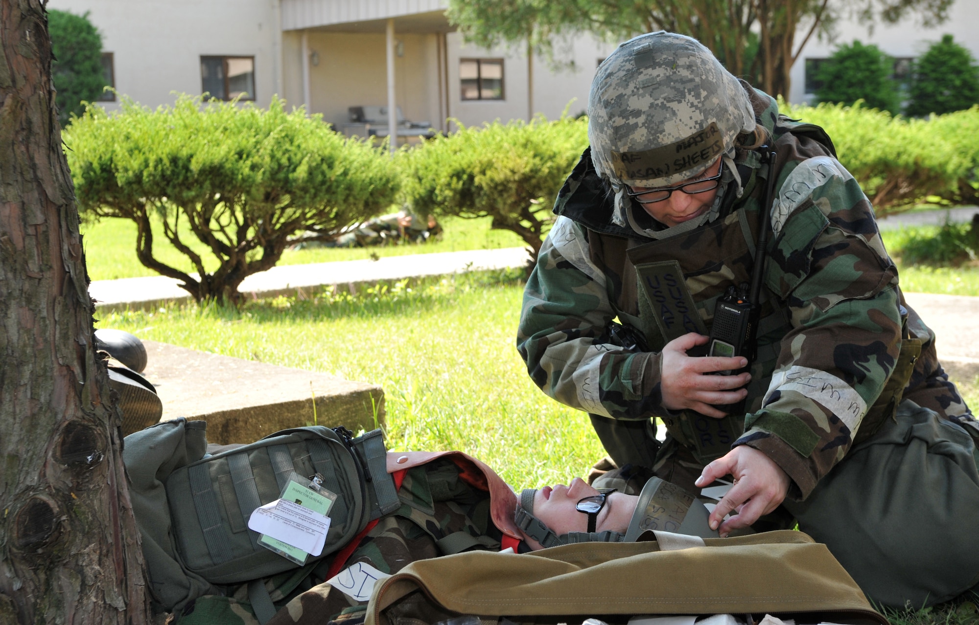 Maj. Susan Sheets, 51st Comptroller Squadron commander, calls in a request for additional support while monitoring a simulated casualty during Operational Readiness Exercise Beverly Bulldog 14-02 at Osan Air Base, Republic of Korea, May 6, 2014. Osan participates in several OREs like BB 14-02 every year. (U.S. Air Force photo/Airman 1st Class Ashley J. Thum)