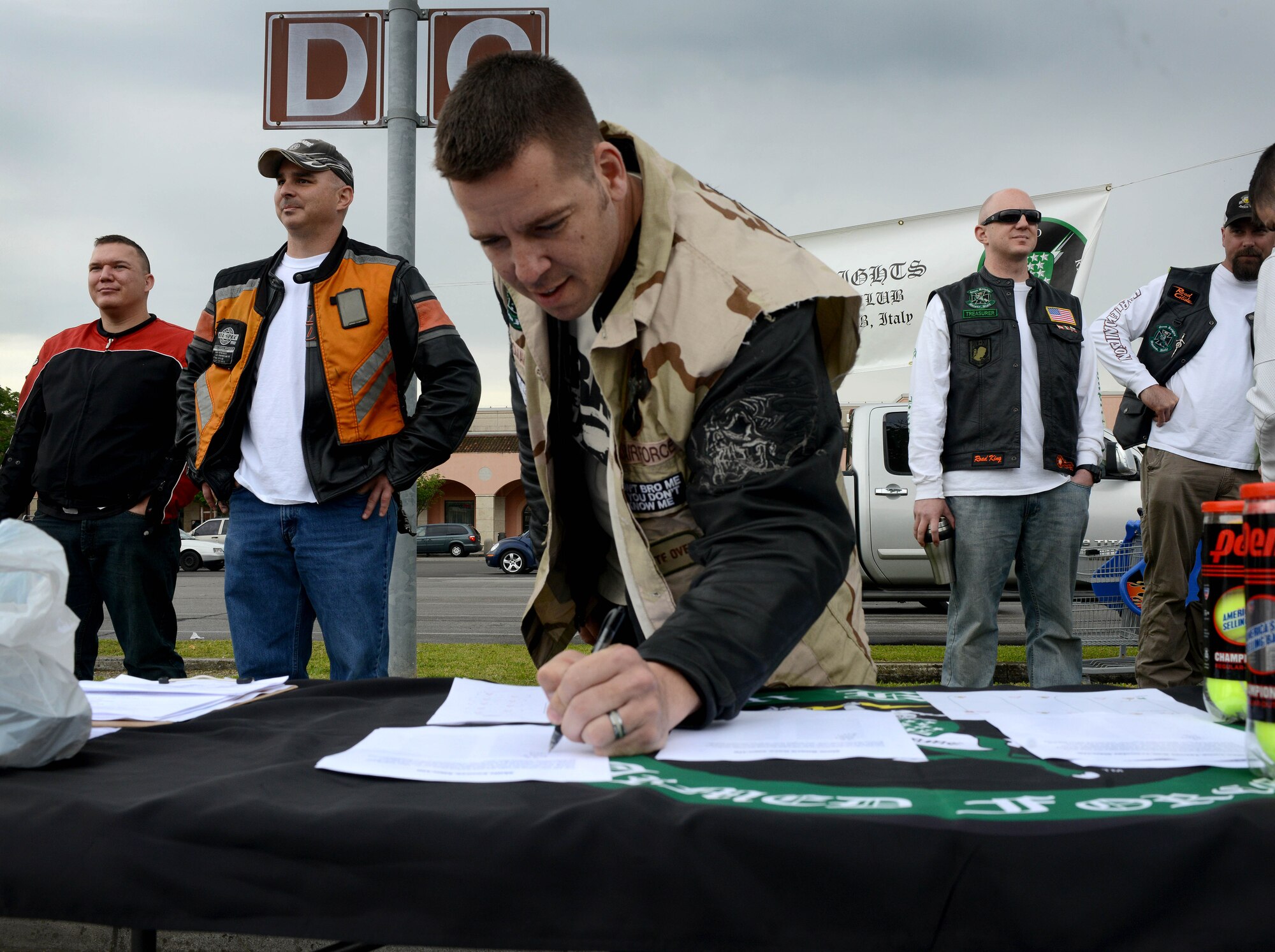 Tech. Sgt. Jason Moomaw, 31st Aircraft Maintenance Squadron, signs up for an event at a motorcycle rodeo, May 2, 2014, at Aviano Air Base, Italy. The 7th annual motorcycle rodeo gave riders a chance to review skills vital to a safe and successful ride. It also gave riders an opportunity to fulfill an annual motorcycle safety requirement required for all service members.  (U.S. Air Force photo/Airman 1st Class Abbey Whittaker) 