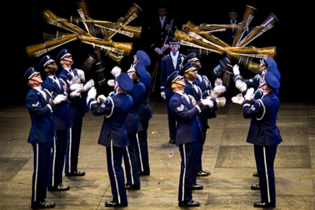 The U.S. Air Force Honor Guard Drill Team performs during the 2014 Virginia International Tattoo at the Scope Arena in Norfolk, Va., April 26, 2014. The annual festival highlights military bands and performers from around the world to honor Vietnam veterans and their families. 