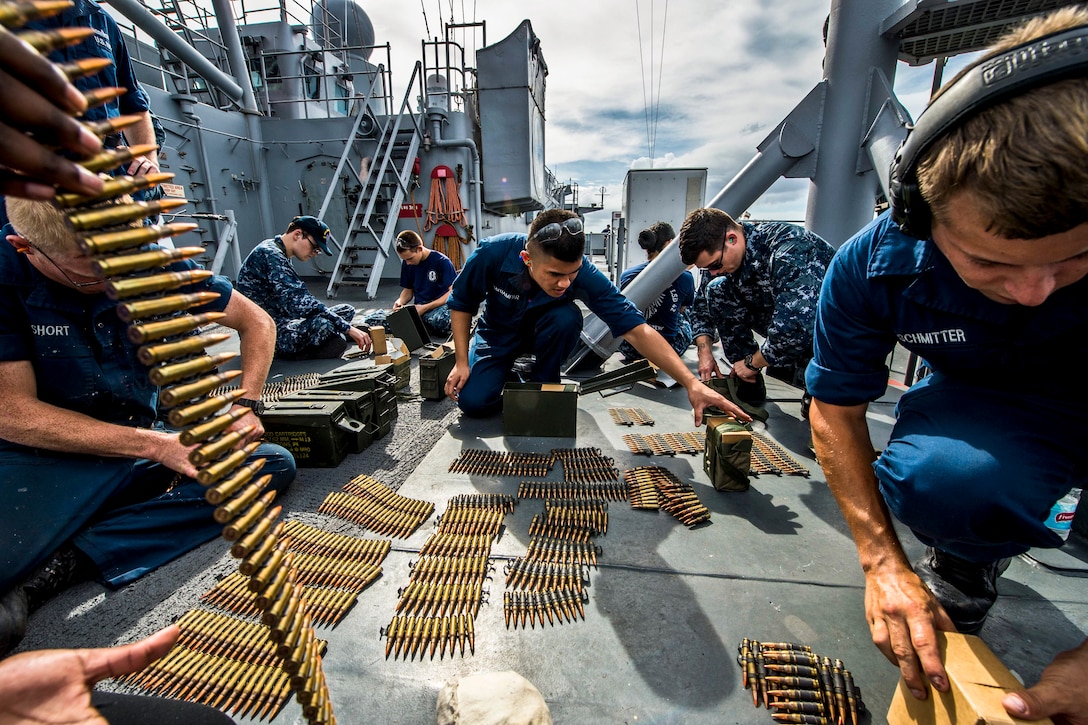 U.S. sailors prepare ammunition for a live-fire exercise on the USS Germantown in the Philippine Sea, Sept. 6, 2013. The Germantown is part of the Bonhomme Richard Amphibious Ready Group and, with the embarked 31st Marine Expeditionary Unit, is conducting routine operations in the U.S. 7th Fleet area of responsibility. The sailors are assigned to the amphibious dock landing ship.  
