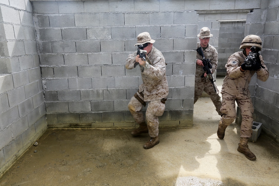 U.S. Marines of Special-Purpose Marine Air-Ground Task Force Crisis Response and soldiers from the Spanish Army Light Infantry Battalion conduct bilateral room sweeping training on Asturias, Spain, April 29, 2014. The training was conducted to further partnership and interoperability between SP-MAGTF CR and the Spanish forces. (U.S. Marine Corps photo by Lance Cpl. Alexander Hill/Released)
