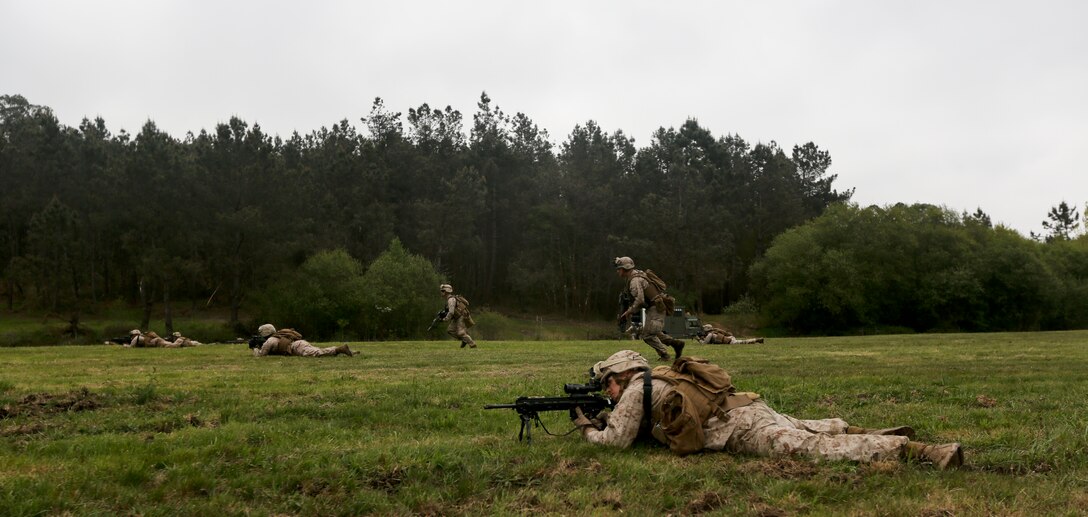 U.S. Marines of Special Purpose Marine Air Ground Task Force Crisis Response conduct fire and movement drills with soldiers from the Spanish Army Light Infantry Battalion on Asturias, Spain, April 29, 2014. The training was conducted to further partnership and interoperability between SP-MAGTF CR and the Spanish forces. (U.S. Marine Corps photo by Lance Cpl. Alexander Hill/Released)
