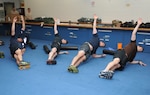 The 103rd Rescue Squadron doing some drills under the supervision of certified physical fitness trainiers from the Hospital for Special Surgery's (HSS) Human performance optimization program (HPO). 

