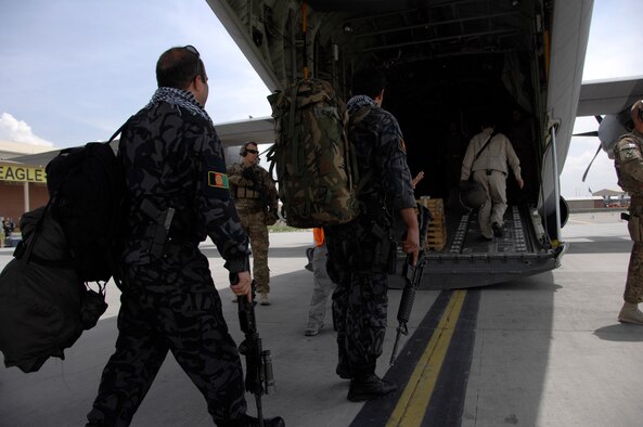 Afghan national army soldiers and advisors board a C-130J-30 May 5, 2014, at Kabul International Airport, Afghanistan. The aircraft is assigned to the 455th Air Expeditionary Wing at Bagram Airfield. Coalition forces delivered personnel and supplies to Fayzabad Airport in support of the recent mudslide in Badakhshan province. (U.S. Air Force photo/Master Sgt. Cohen A. Young)