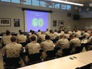 Marines with 8th Engineer Support Battalion, 2nd Marine Logistics Group receive a class from a border patrol agent during a two-month project with Joint Task Force North in El Centro, Calif., March – April, 2014. Service members constructed approximately 1,800 feet of road and five culverts, allowing border patrol agents to expand their tactical mobility by opening the route to more than just all-terrain vehicles.