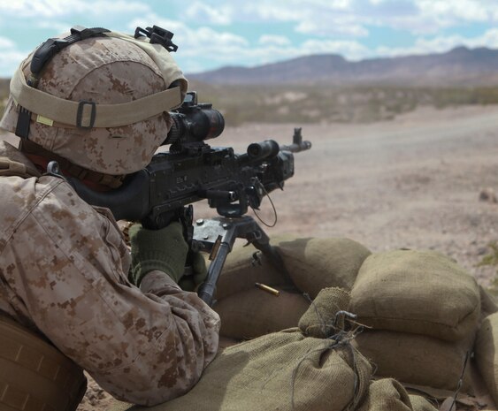 Reading, Penn., native Pfc. Cody Troxel, a machine gunner with Echo Company, 2nd Battalion, 8th Marine Regiment, 2nd Marine Division, fires his M240 Bravo machine gun during a live-fire exercise at Range 62, on Fort Bliss, Texas, April 6, 2014.