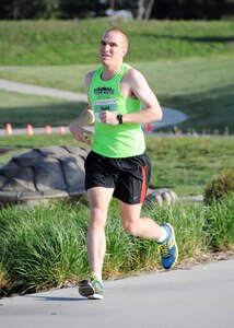 Sgt. Alex Sico, a radio and communications security repairer with the 3650th Maintenance Company from the Colorado Army National Guard, approaches the midway point of the Lincoln National Guard Marathon in Lincoln, Neb., May 4. Sico won the National Guard’s male division title with a time of 2 hours, 39 minutes, 20 seconds.