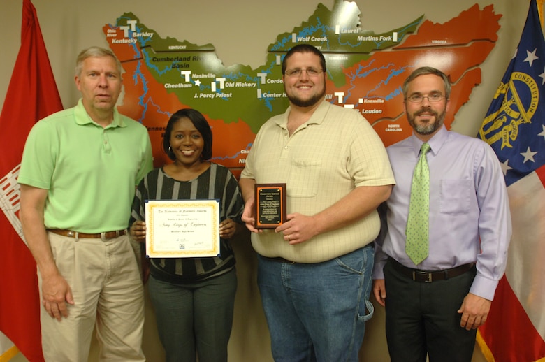 (Left to right) Bob Sneed, U.S. Army Corps of Engineers Nashville District Water Management Section chief; Stephanie Coleman, Nashville District Equal Employment Opportunity specialist, Rob Baulsir, Nashville District mechanical engineer and STEM Program coordinator, and Ben Rohrbach, Nashville District Hydrology and Hydraulics Branch chief, pose May 7, 2014 with the awards that were received from Stratford STEM Magnet School during its “Student, Parent and Partner Success Celebration” May 5. They represent the district employees who invested more than 500 hours toward the partnership with the school that benefitted teachers and students.