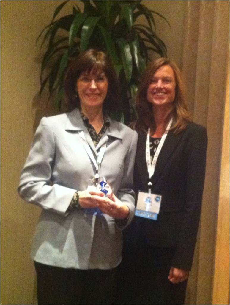 Dr. Nichole Elko (right), American Shore and Beach Preservation Association (ASBPA) secretary and leader of the Science and Technology committee, is pictured with ERDC-CHL’s Dr. Julie Dean Rosati, recipient of the ASBPA Presidential Award.  