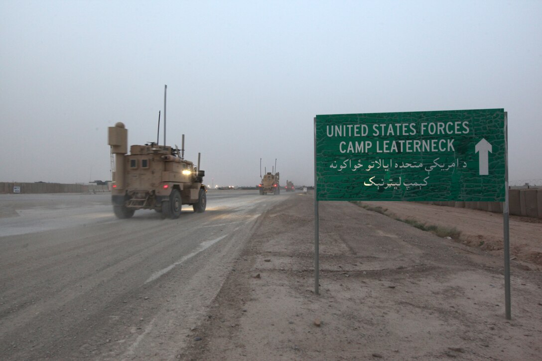 A convoy of vehicles with some of the last Marines, sailors and equipment returning from Sangin Valley entered friendly lines aboard Camp Leatherneck, Afghanistan, May 5, 2014. The last Marines, sailors and equipment exited FOBs Nolay and Sabit Qadam, May 5, 2014, leaving the 2nd Brigade, 215th Corps, Afghan National Army in full control of the FOBs and the surrounding area for the first time without advisors in place since coalition forces entered during 2006. (U.S. Marine Corps Photo By: Sgt. Frances Johnson/Released)