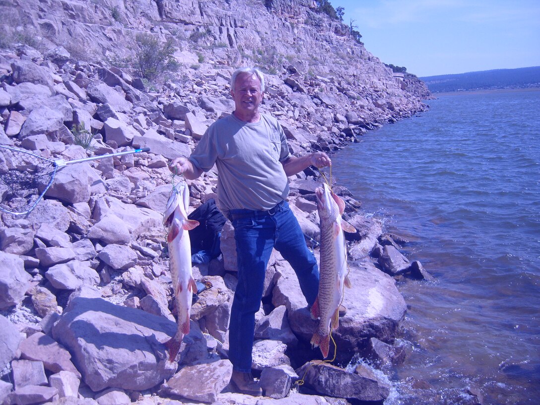 BLUEWATER LAKE, N.M., -- A fisherman shows off his catch June 2, 2012. Photo by Paul Rebarchik.