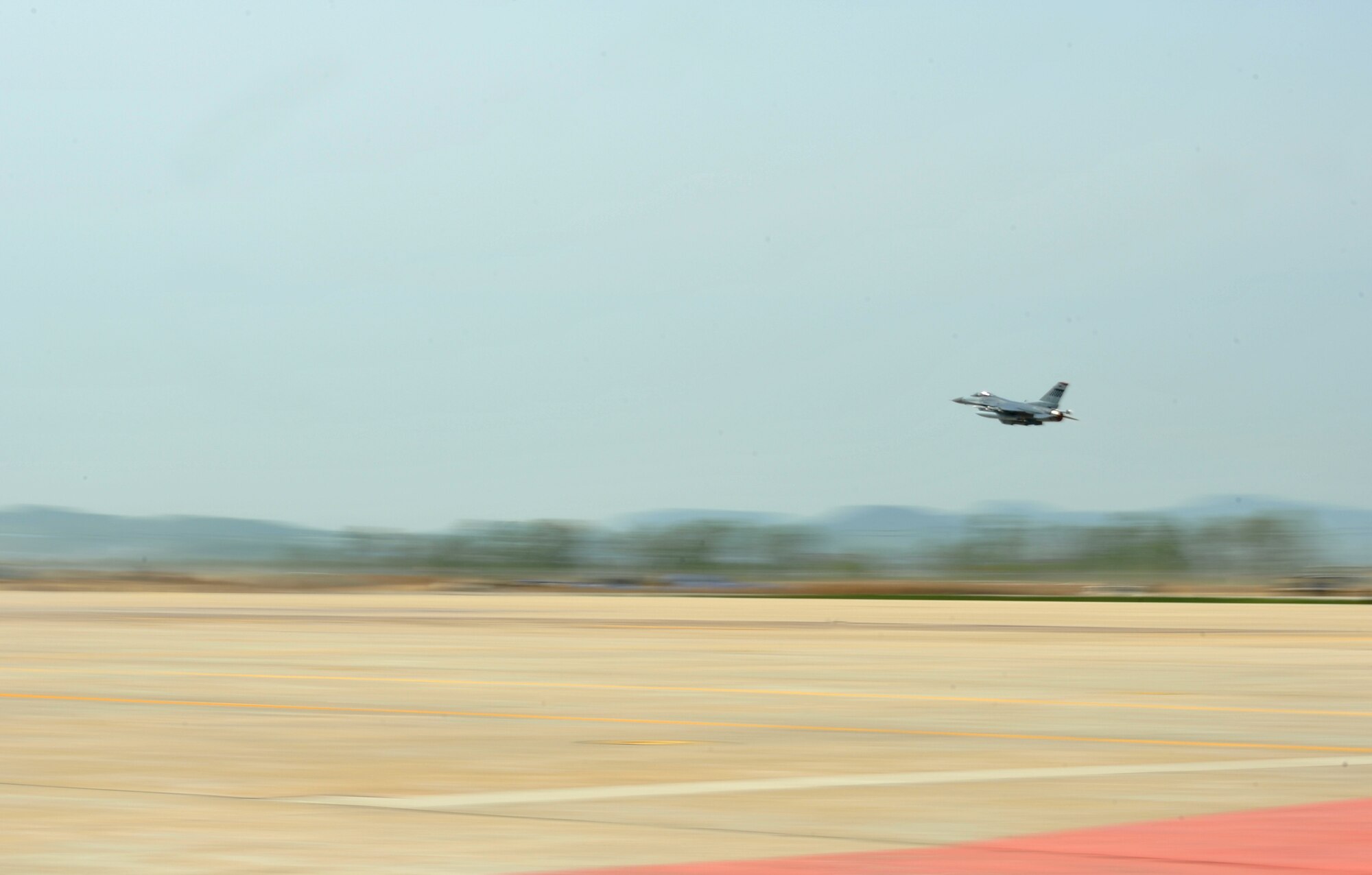 An F-16 Fighting Falcon from the 36th Fighter Squadron takes to the skies during Operational Readiness Exercise Beverly Bulldog 14-02 at Osan Air Base, Republic of Korea, May 7, 2014. OREs give aircrews and pilots from both of Osan’s fighter squadrons critical time to practice performing at the optimum level needed to succeed during real-world contingency operations. (U.S. Air Force photo/Airman 1st Class Ashley J. Thum)