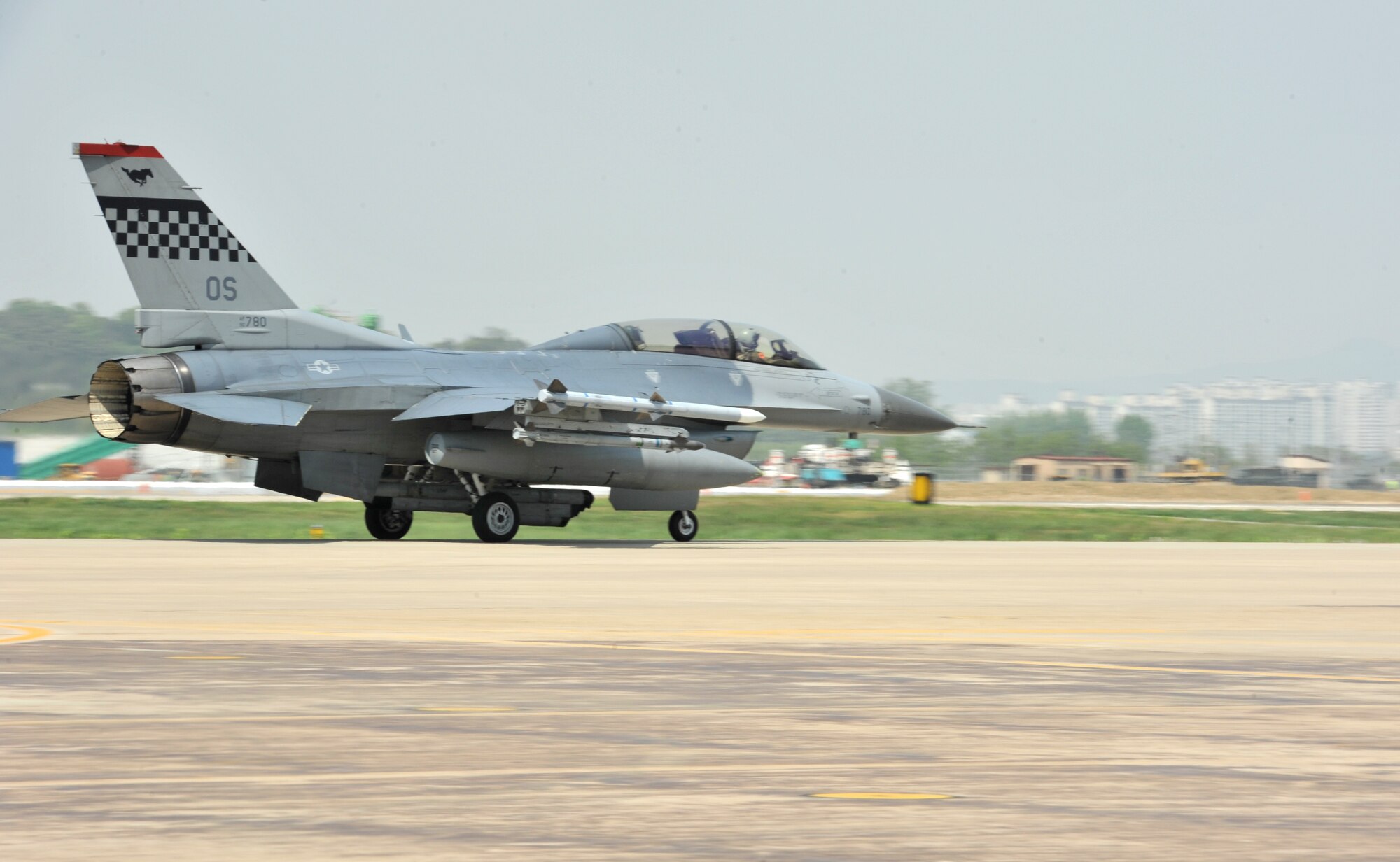 An F-16 Fighting Falcon from the 36th Fighter Squadron taxis down the runway during Operational Readiness Exercise Beverly Bulldog 14-02 at Osan Air Base, Republic of Korea, May 7, 2014. The 51st Fighter Wing has flown more than 100 training sorties since the start of BB 14-02. (U.S. Air Force photo/Airman 1st Class Ashley J. Thum)