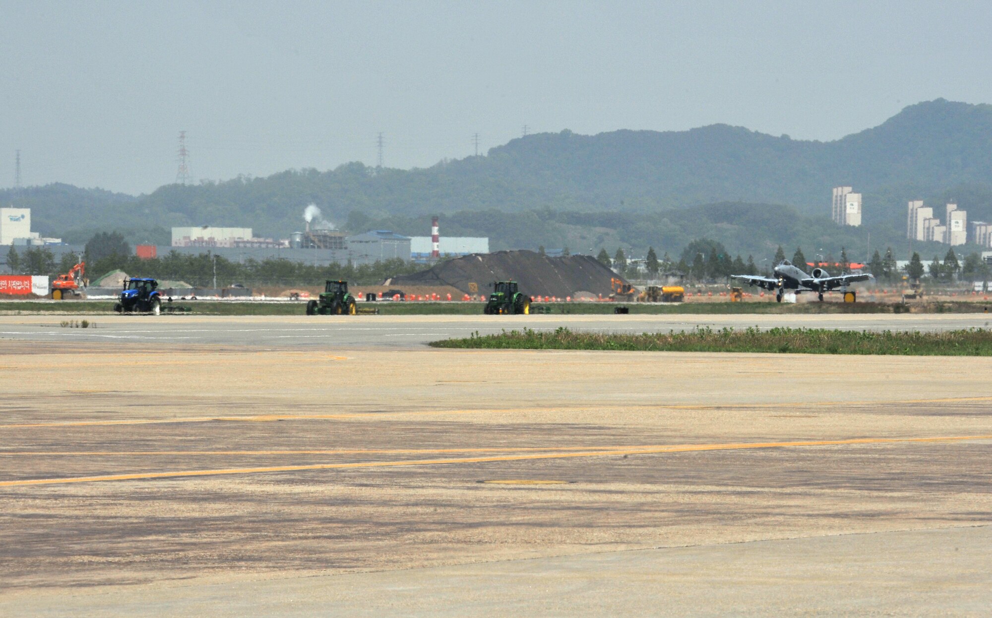 An A-10 Thunderbolt II from the 25th Fighter Squadron touches down after returning from a training sortie during Operational Readiness Exercise Beverly Bulldog 14-02 at Osan Air Base, Republic of Korea, May 7, 2014. Training sorties are an integral part of any ORE, along with practicing other wartime skills like base defense; chemical, biological, radiological and nuclear decontamination; and self-aid and buddy care. (U.S. Air Force photo/Airman 1st Class Ashley J. Thum)
