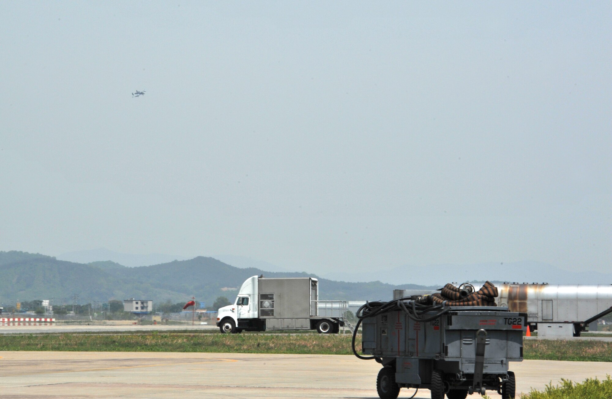 An A-10 Thunderbolt II from the 25th Fighter Squadron descends in preparation for landing during Operational Readiness Exercise Beverly Bulldog 14-02 at Osan Air Base, Republic of Korea, May 7, 2014. The 25th and 36th Fighter Squadrons are key to helping United States Forces Korea maintain stability on the Korean peninsula. (U.S. Air Force photo/Airman 1st Class Ashley J. Thum)