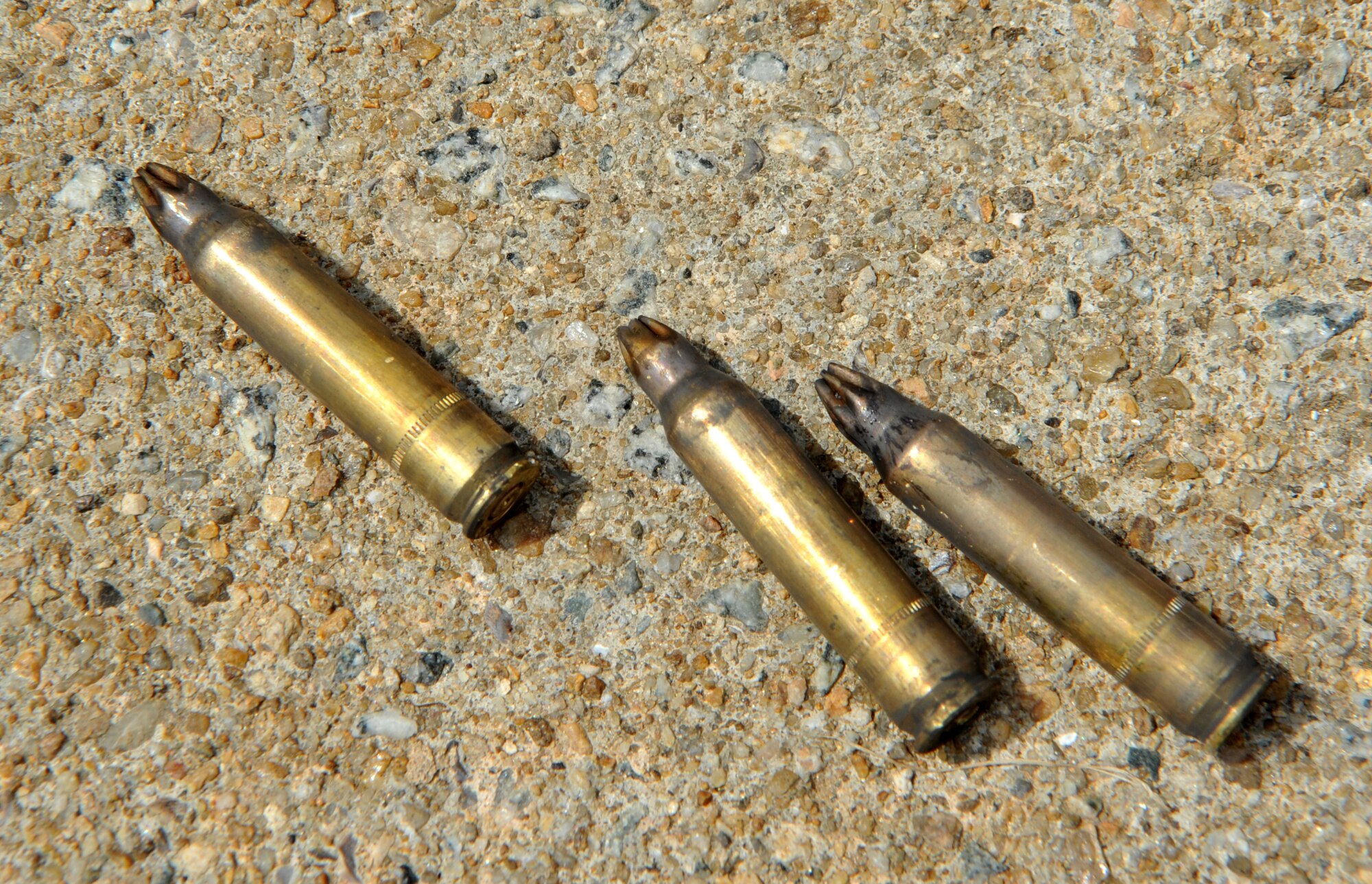 Spent shell casings from blank rounds cover the mock battlefield after a scenario during Operational Readiness Exercise Beverly Bulldog 14-02 at Osan Air Base, Republic of Korea, May 7, 2014. Facilitators often employ blank rounds and smoke grenades during opposition forces training exercises to help participants become accustomed to the sights and sounds of an enemy engagement. (U.S. Air Force photo/Airman 1st Class Ashley J. Thum)