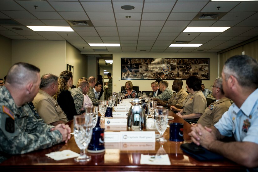 Secretary of the Air Force Deborah Lee James (center) is given a mission briefing May 6, 2014, by base leadership at Joint Base Charleston, S.C. JB Charleston was established in October 2010, and is home to the 628th Air Base Wing, the 437th and 315th Airlift Wings, and more than 50 tenant commands which were all highlighted during the briefing. James is the 23rd Secretary of the Air Force and was appointed to the position Dec. 20, 2013. She is responsible for the affairs of the Department of the Air Force, including organizing, training, equipping and providing for the welfare of its more than 690,000 active-duty, Guard, Reserve and civilian Airmen and their families. (U.S. Air Force photo/ Senior Airman Dennis Sloan)