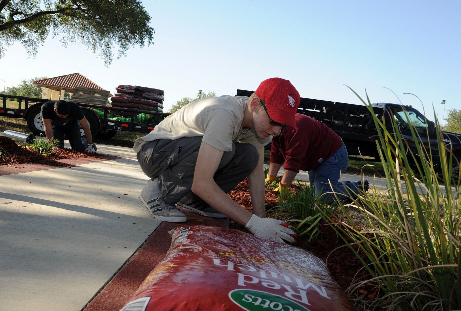 Zachary Hinsvark, Randolph High School sophomore, spreads mulch Saturday at Joint Base San Antonio-Randolph Heritage Park as part of his Eagle Scout project.
(U.S. Air Force photo by Airman 1st Class Kenna Jackson)
