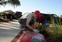 Zachary Hinsvark, Randolph High School sophomore, spreads mulch Saturday at Joint Base San Antonio-Randolph Heritage Park as part of his Eagle Scout project.
(U.S. Air Force photo by Airman 1st Class Kenna Jackson)
